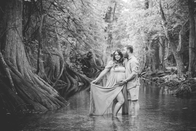 Yoli maternity session at Cibolo Natural Area couple in the water black and white