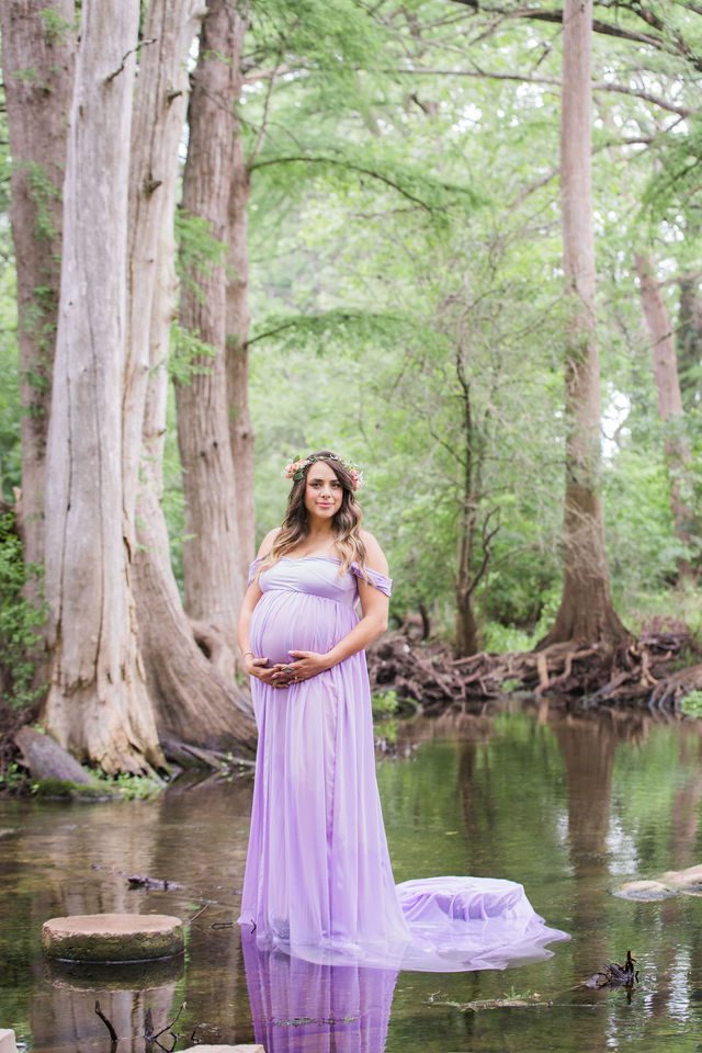 Yoli maternity session at Cibolo Natural Area in the water on the rounds