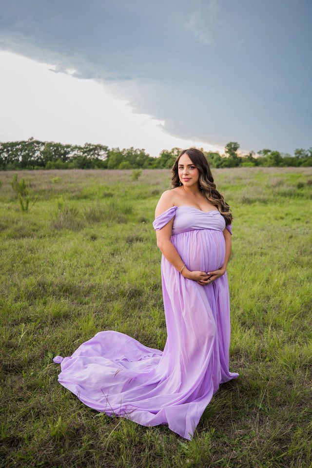 Yoli maternity session at Cibolo Natural Area in the grass at sunset