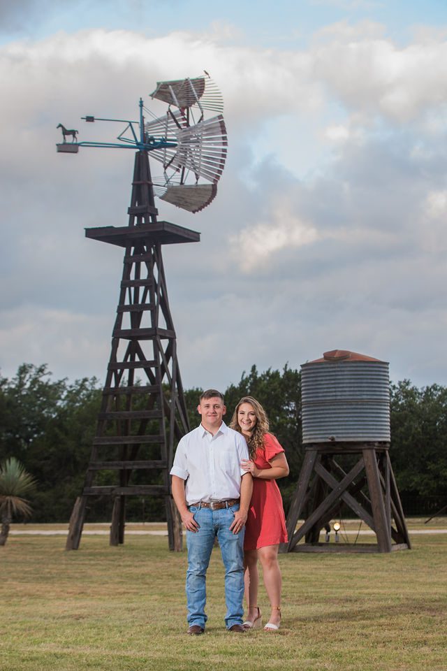 Brighten's engagement session at Western Sky in San Antonio in front of the water tower