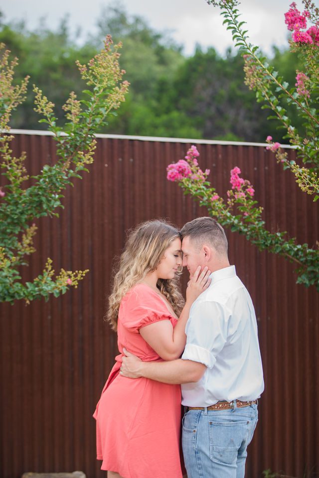 Brighten's engagement session at Western Sky in San Antonio in front of the barn