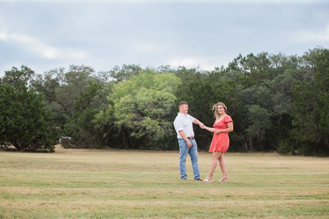 Brighten's engagement session at Western Sky in San Antonio in the field