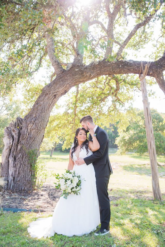 Nadine's wedding at Kendall point in San Antonio under the tree