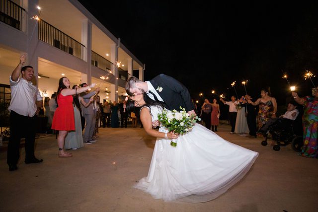 Nadine's wedding at Kendall Point in San Antonio reception sparkler exit dip