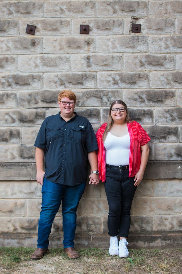 Ryanne engagement in New Braunfels at Gruene Hall's jail wall