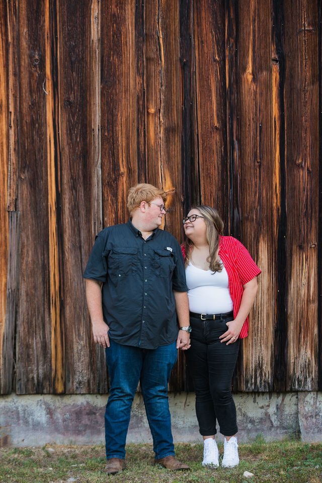 Ryanne engagement at Gruene Hall in New Braunfels by rustic wall