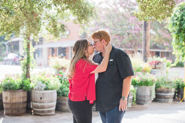 Ryanne engagement at Gruene Hall in New Braunfels bride and groom in the flowers