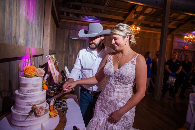 Kirt wedding reception at Eagle Dancer Ranch cake cutting