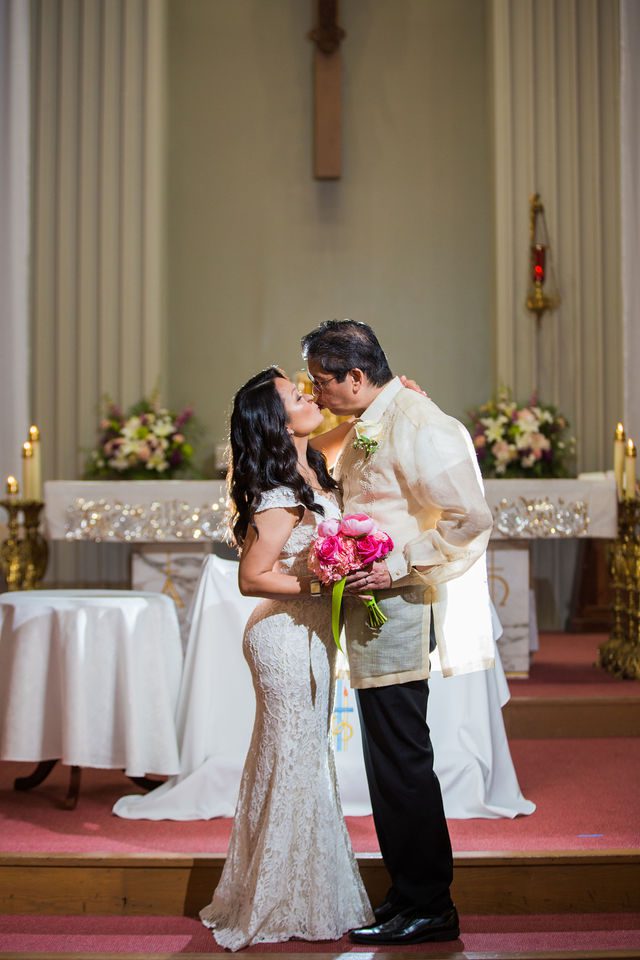 May's wedding in San Antonio OLPH alter kiss portrait