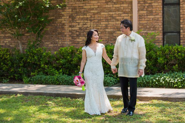 May's wedding in San Antonio OLPH groom and bride walking