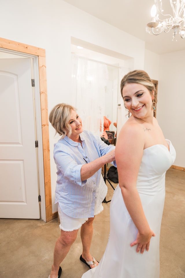 Brighten wedding at Western Sky bride dressing with mother