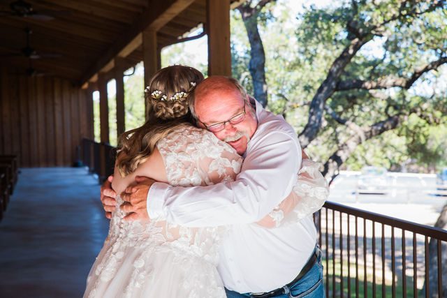Ryanne's Wedding at the Chandelier of Gruene father first look hug
