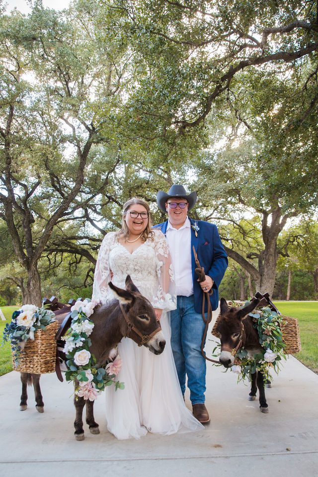 Ryanne's Wedding at the Chandelier of Gruene couple with donkeys portraits