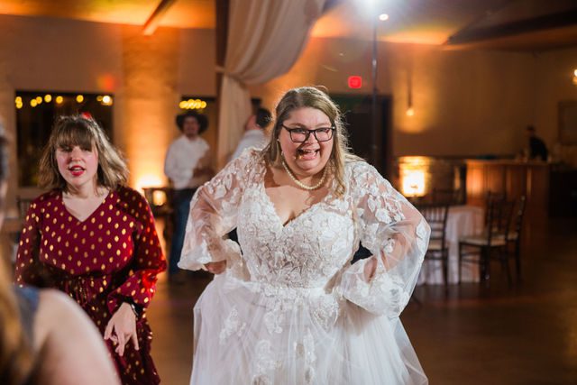 Ryanne's Wedding reception at the Chandelier of Gruene bride dancing