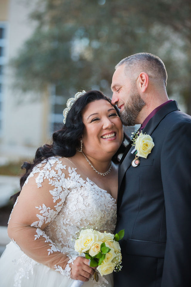Bride and groom smiling in San Antonio
